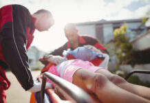 injured person on gurney